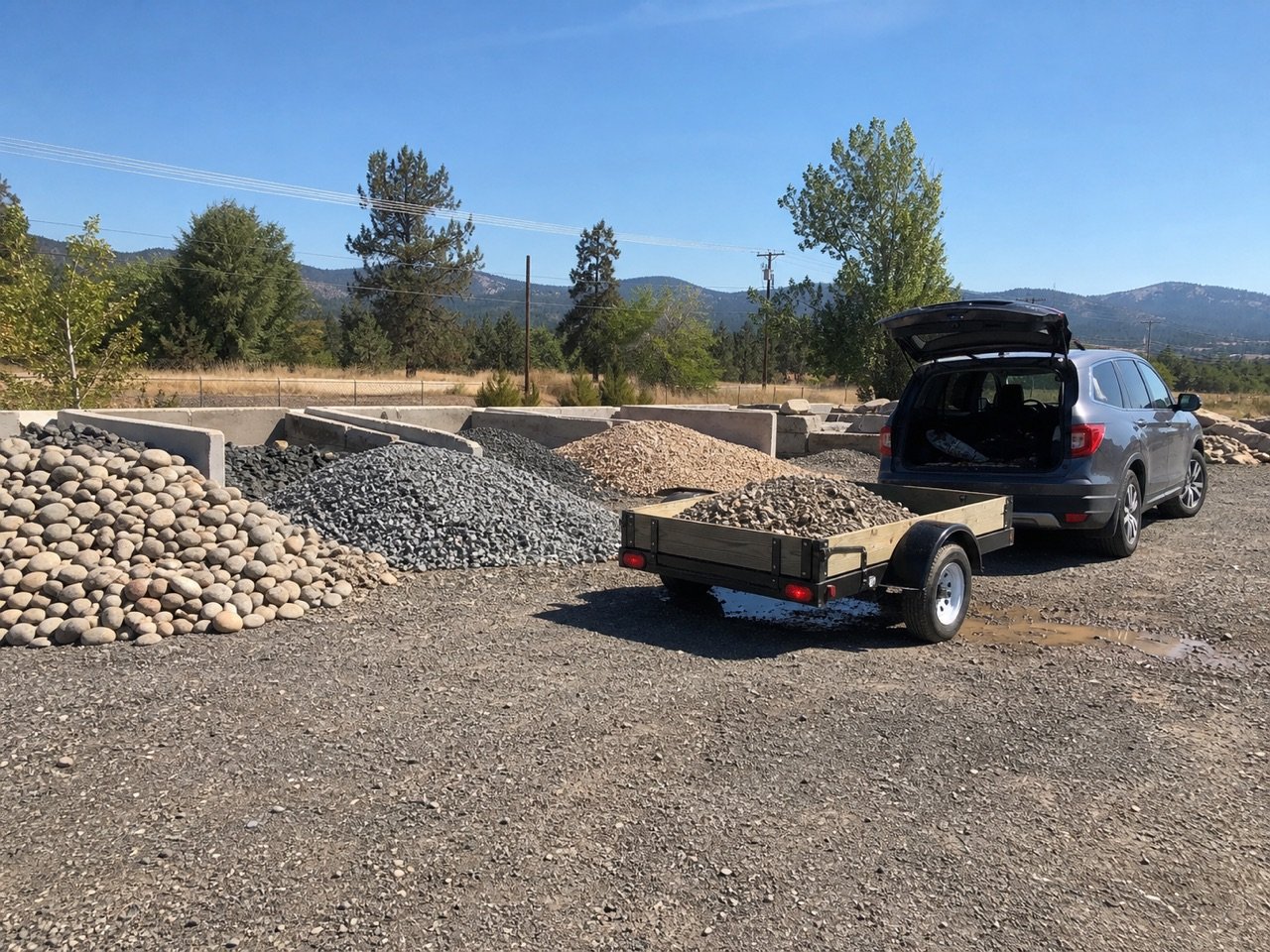 Retail selection of decorative rock, drain rock, and crushed gravel